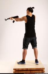 Jerald-mob-aiming-shooting-ak