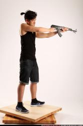 Jerald-mob-aiming-shooting-ak