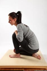 Woman Young Athletic White Neutral Kneeling poses Casual