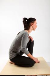 Woman Young Athletic White Neutral Kneeling poses Casual