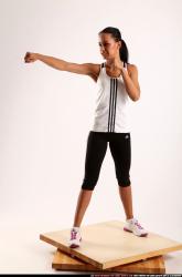 Woman Young Athletic Fitness poses Standing poses Sportswear Latino