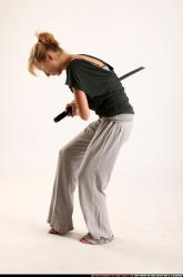 Woman Adult Athletic White Fighting with sword Moving poses Casual