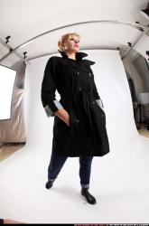 Woman Adult Athletic White Daily activities Moving poses Coat