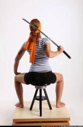 Woman Adult Athletic White Fighting with sword Sitting poses Army