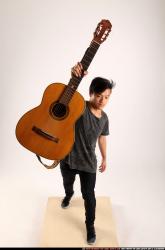 Jerald-lifting-guitar