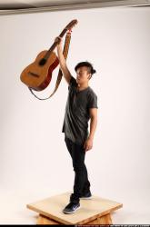 Jerald-lifting-guitar