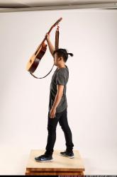 Jerald-lifting-guitar
