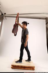 Jerald-lifting-guitar