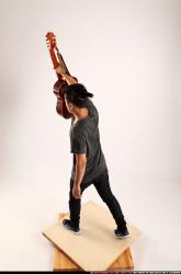 Jerald-lifting-guitar