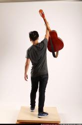 Jerald-lifting-guitar
