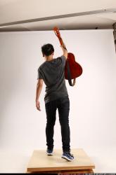 Jerald-lifting-guitar