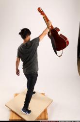 Jerald-lifting-guitar