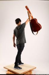 Jerald-lifting-guitar