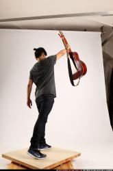 Jerald-lifting-guitar