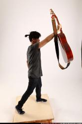 Jerald-lifting-guitar