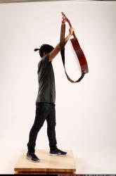 Jerald-lifting-guitar