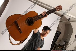 Jerald-lifting-guitar
