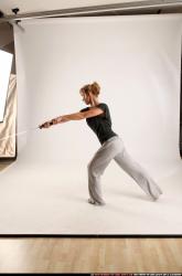 Woman Adult Athletic White Fighting with sword Standing poses Casual
