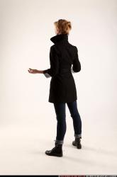 Woman Adult Athletic White Holding Standing poses Coat