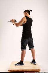 Jerald-mob-shooting-uzi