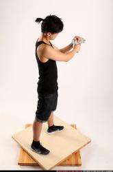 Jerald-mob-shooting-uzi