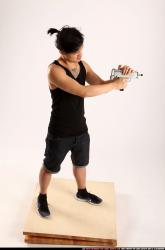 Jerald-mob-shooting-uzi