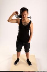 Jerald-mob-standing-ak-pose