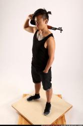 Jerald-mob-standing-ak-pose