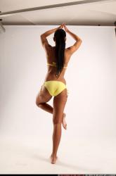 Woman Young Athletic Fitness poses Standing poses Sportswear Latino