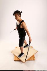 Jerald-mob-dual-swords-pose2