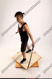 Jerald-mob-dual-swords-pose2