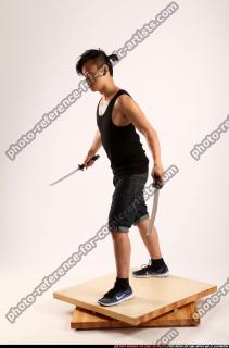 Jerald-mob-dual-swords-pose2