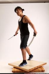 Jerald-mob-dual-swords-pose2