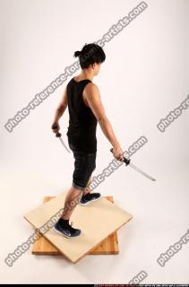 Jerald-mob-dual-swords-pose2