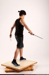 Jerald-mob-dual-swords-pose2