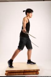 Jerald-mob-dual-swords-pose2