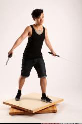 Jerald-mob-dual-swords-pose2