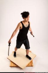 Jerald-mob-dual-swords-pose2