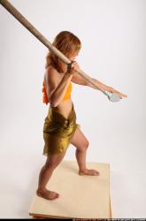 amy-prehistoric-standing-spear-attack