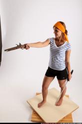 Woman Adult Athletic White Fighting with gun Standing poses Army