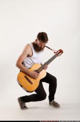 oscar-playing-guitar-various