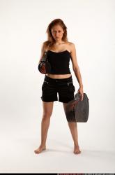 Woman Adult Athletic White Fighting with submachine gun Standing poses Casual