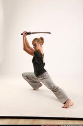 rachel-kneeling-sword-pose