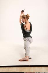 rachel-kneeling-sword-pose