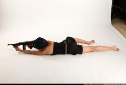 agnes-laying-shooting-tommygun