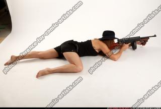 2015 12 AGNES LAYING SHOOTING TOMMYGUN 06 A