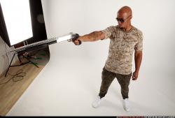 Ron-shotgun-pose3