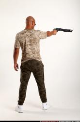 Ron-shotgun-pose3