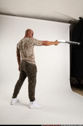 Ron-shotgun-pose3