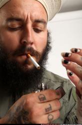 edgar-lighting-up-cigarette